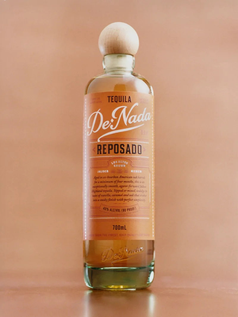 De Nada Reposado on a terracotta wall